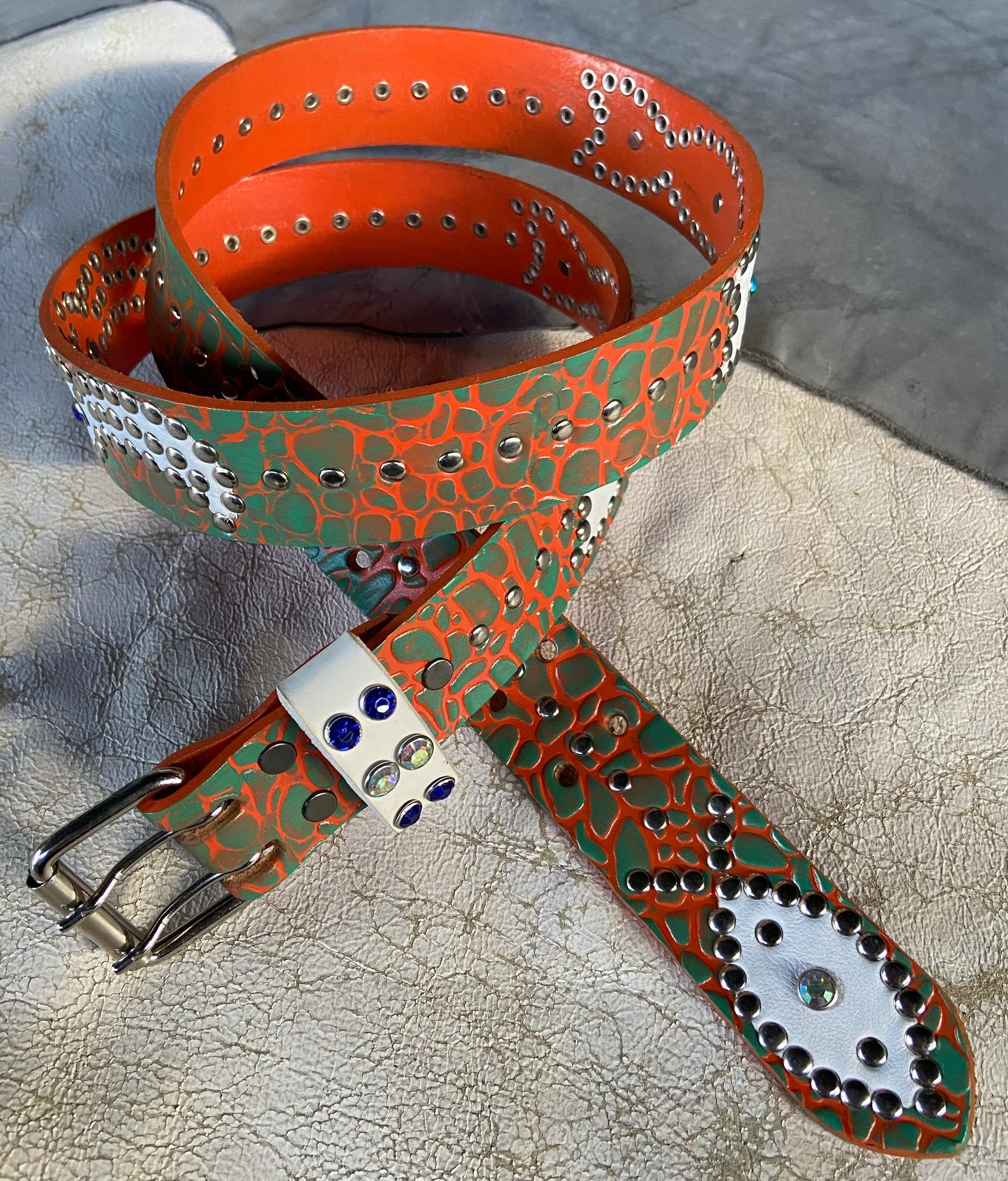 Elephant orange + turquoise Embossed Origins Belt (white)