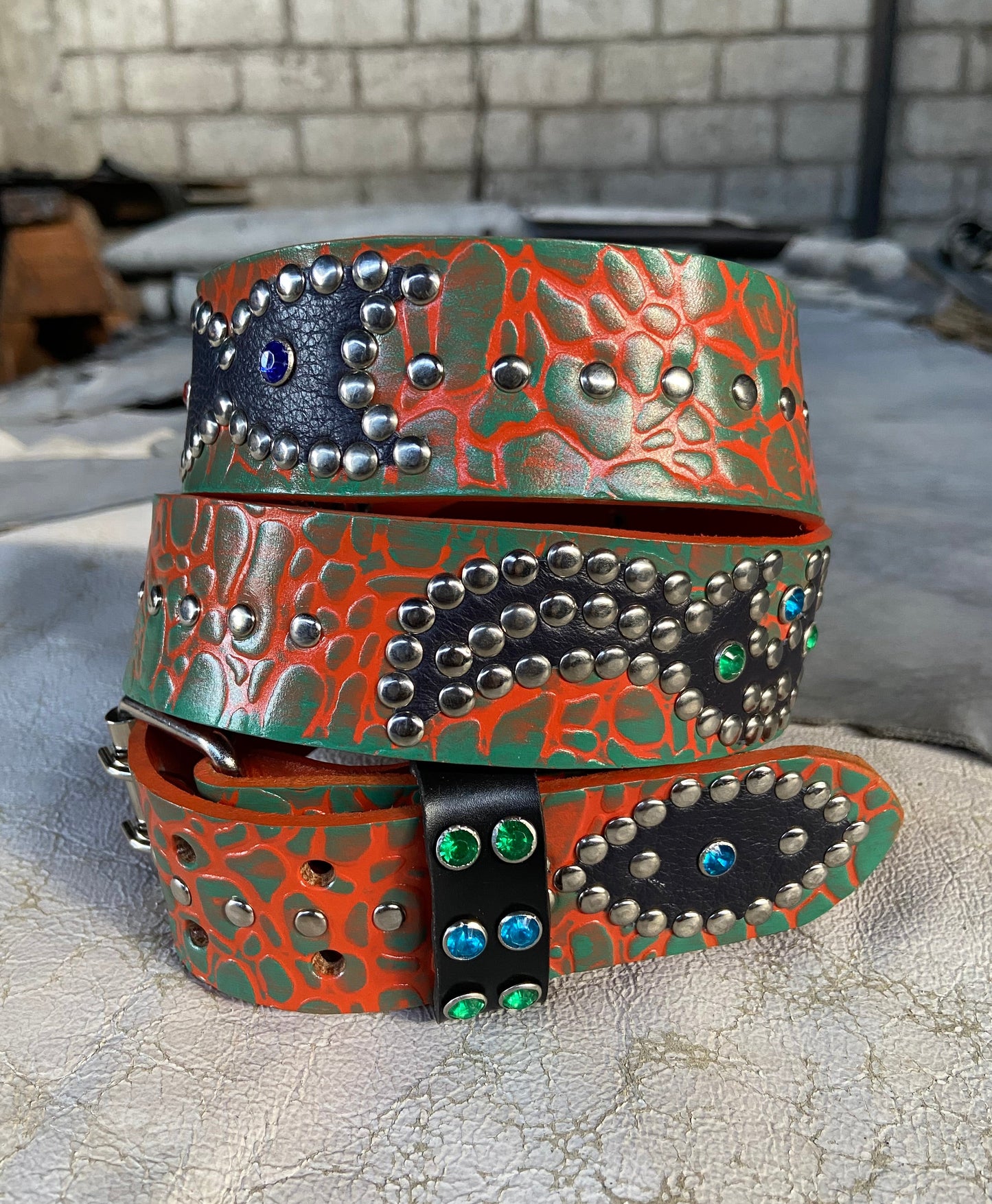 Elephant orange + turquoise Embossed Origins Belt (black)