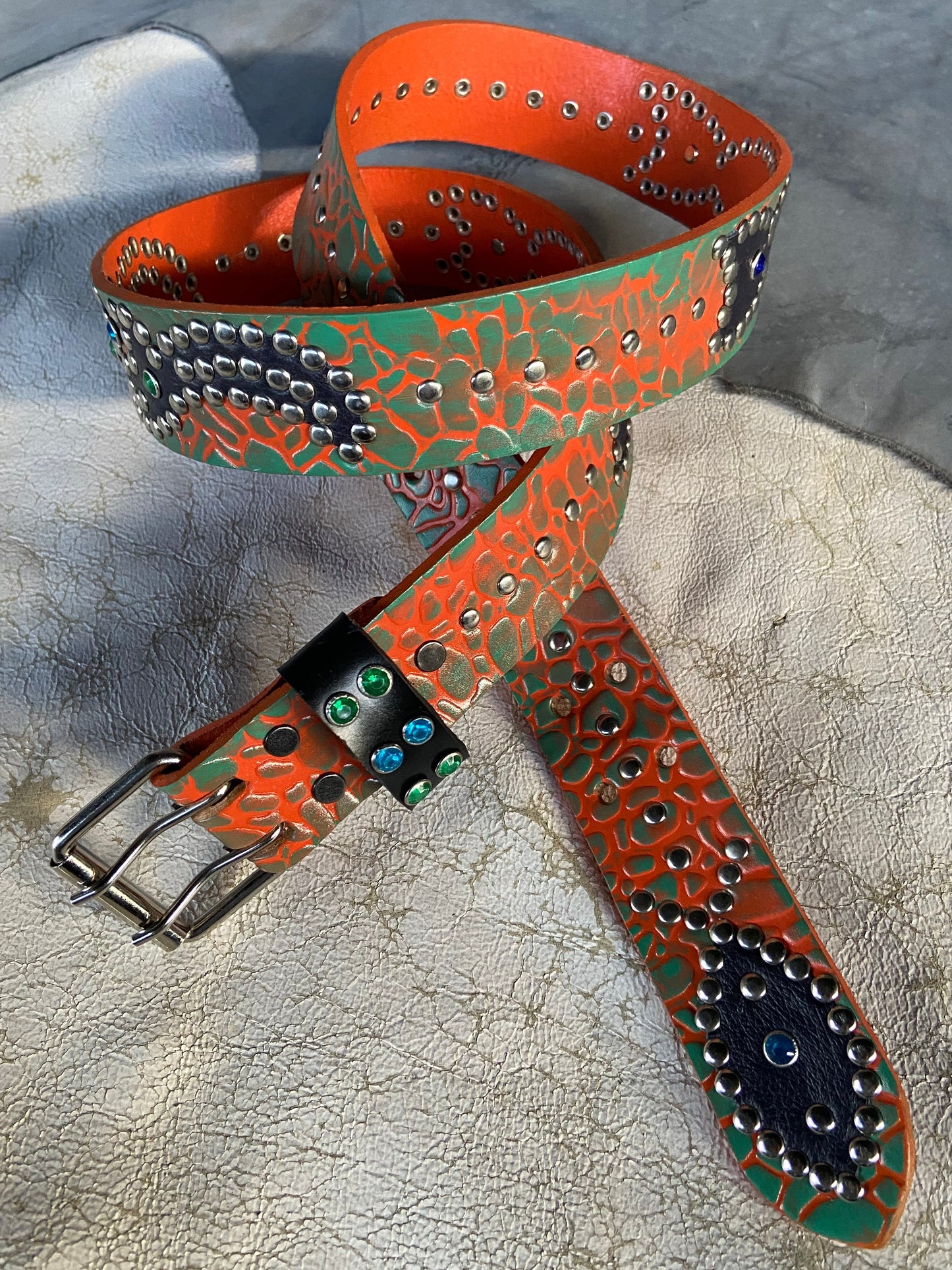 Elephant orange + turquoise Embossed Origins Belt (black)