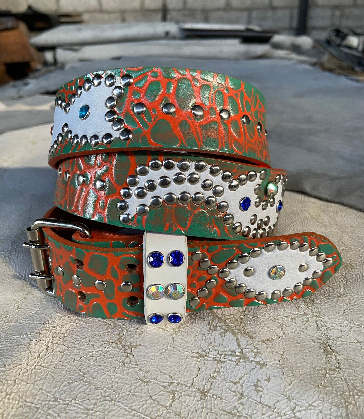Elephant orange + turquoise Embossed Origins Belt (white)